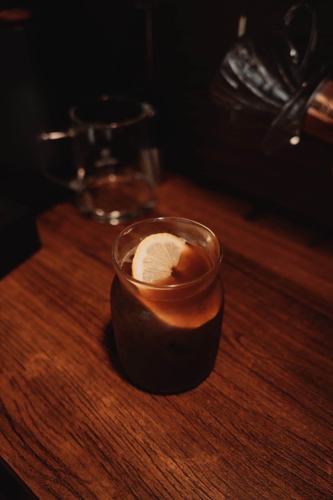 Cold brew garnished with a lemon slice